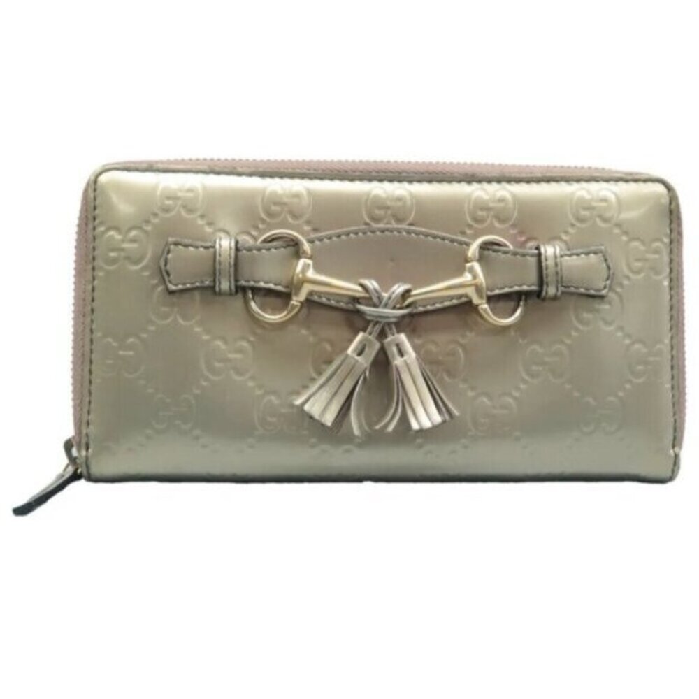 Authentic Gucci Champaigne Metallic Gold GG Tassel Zip Around Wallet